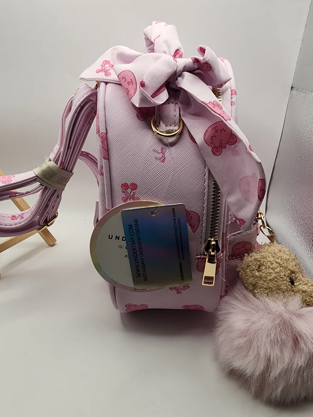 Under One Sky Pink Backpack with Bow and Pom Keychain